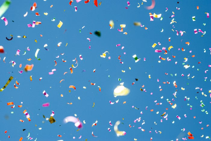 Confetti against blue sky